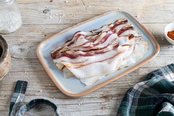 Panceta adobada fileteada